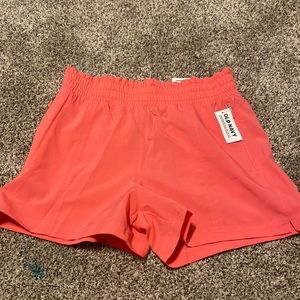 Pink cut shorts with two zippers on the side from old navy